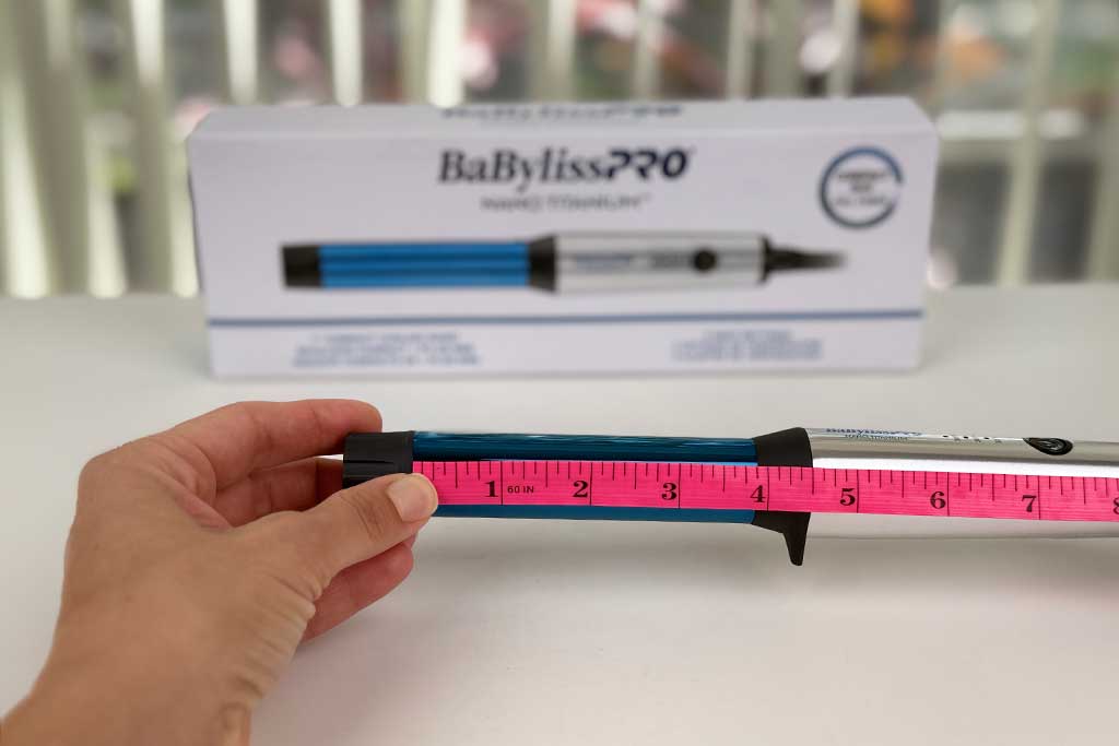 Measuring the BaBylissPRO Compact Wand barrel with calipers, showing 3.8 inches.