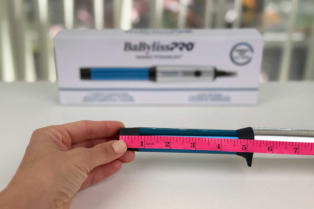 Caliper measuring the cool tip of the BaBylissPRO Compact Wand at 0.8 inches.