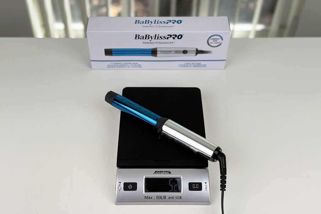 Digital scale showing 5.2 ounces with the BaBylissPRO Compact Wand on top.