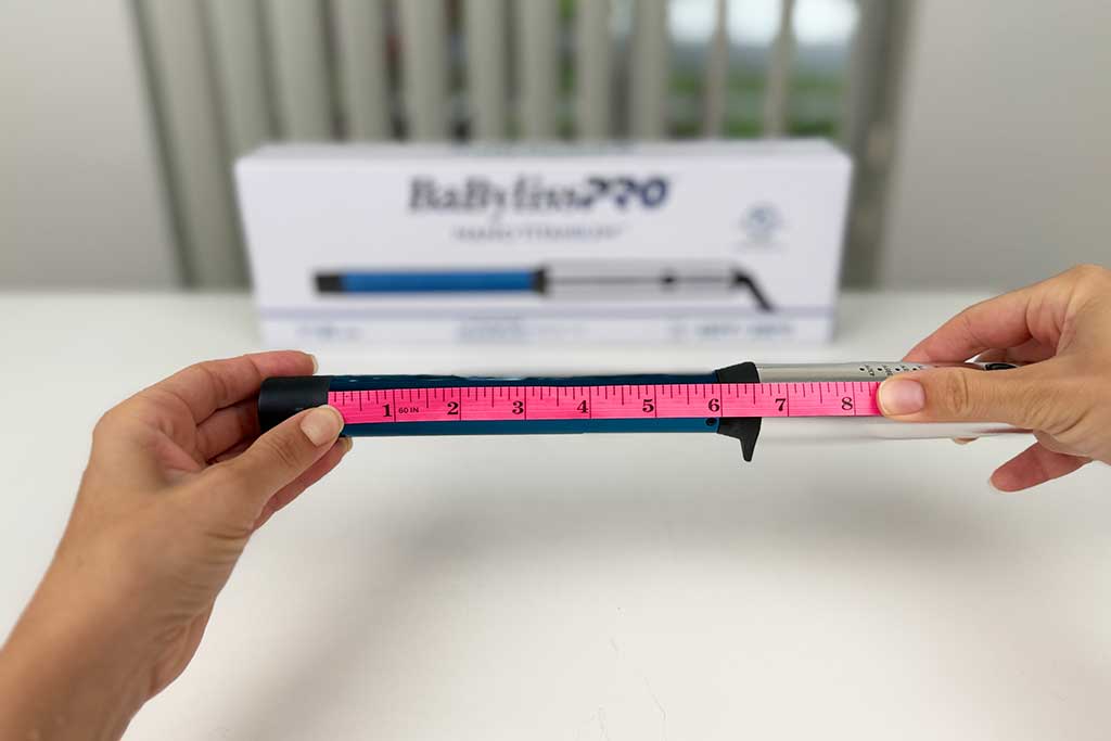 Caliper measuring the 6-inch titanium barrel of the BaBylissPRO Nano Titanium Curling Wand.
