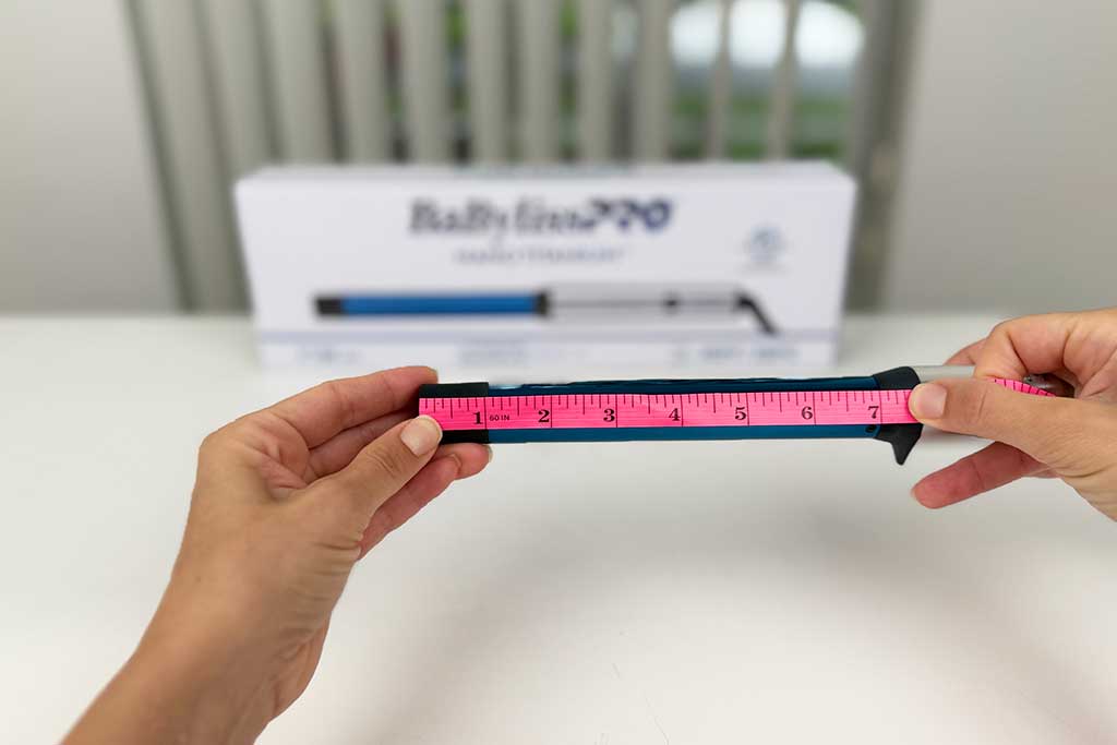 Caliper showing the 1-inch cool tip of the BaBylissPRO Curling Wand.