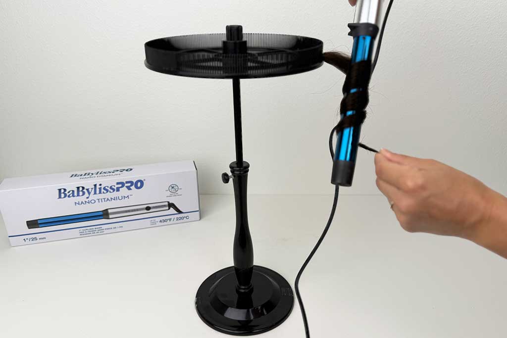 Human hair wig wrapped around the 1-inch barrel of the BaBylissPRO Curling Wand.