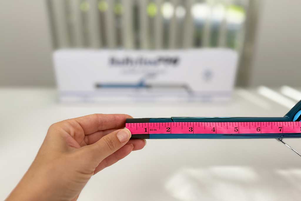 Caliper measuring the 1-inch cool tip of the BaBylissPRO Nano Titanium Extended Barrel Curling Iron.