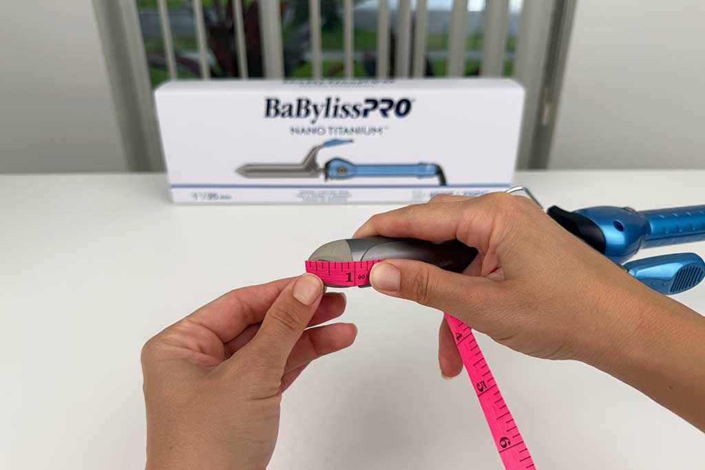 Digital caliper measuring the 1″ cool tip of the BaBylissPRO Nano Titanium Spring Curling Iron.