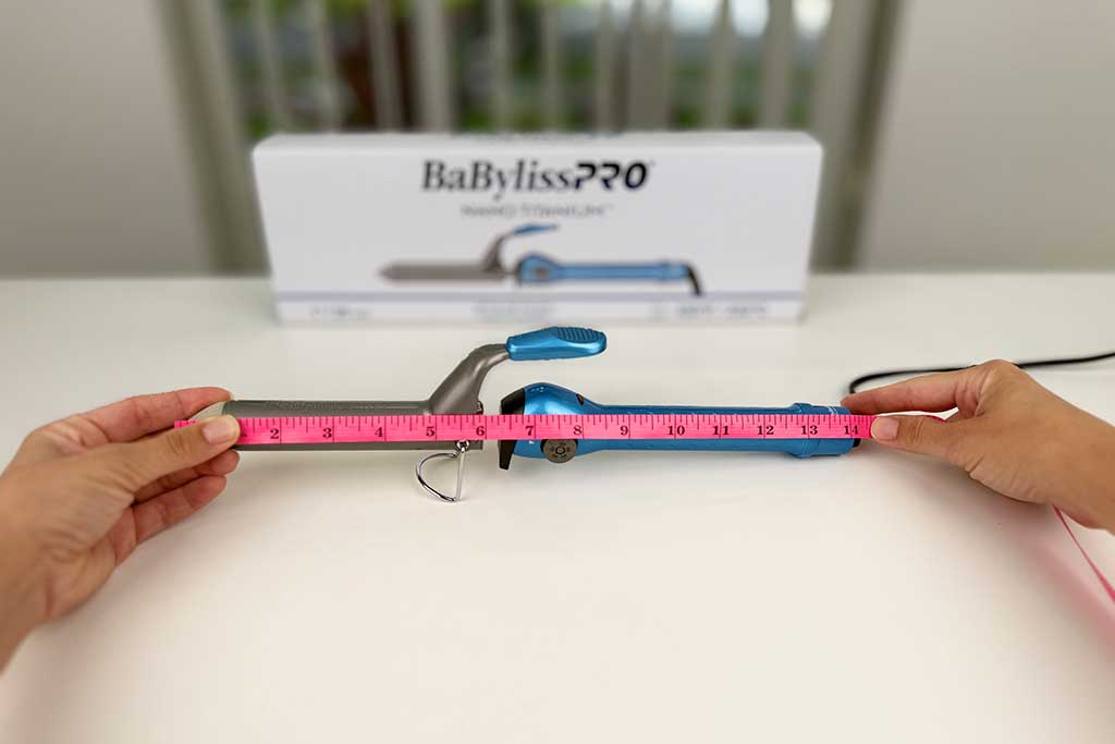 Measuring tape showing total tool length of 14″ for the BaBylissPRO Nano Titanium Spring Curling Iron.