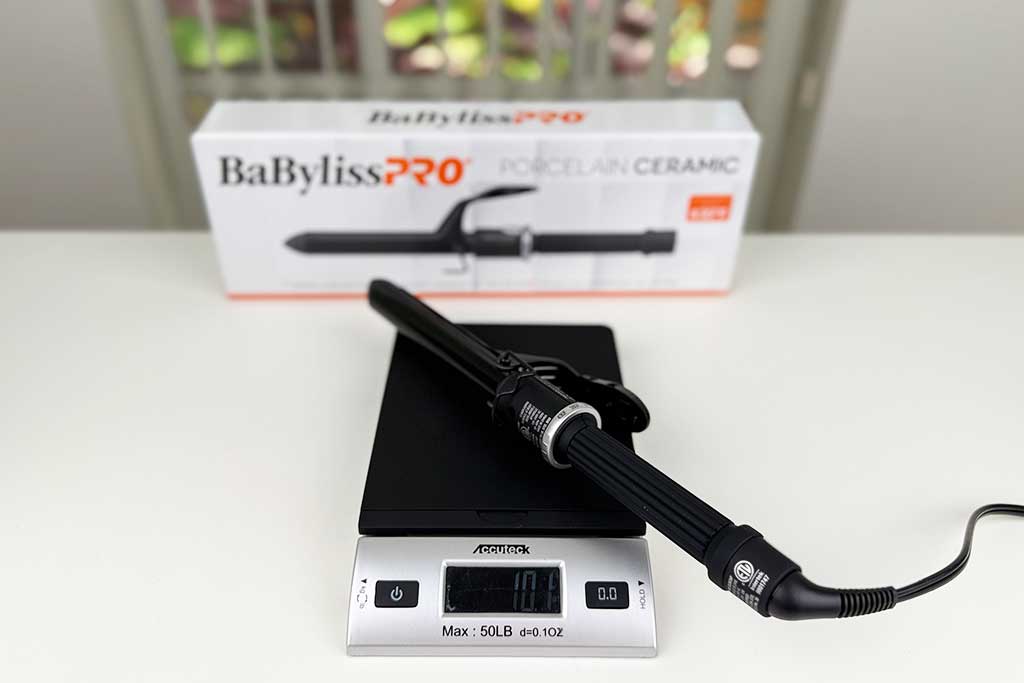Digital scale displaying 10.1 ounces with the BaBylissPRO Porcelain Ceramic Spring Curling Iron on top.