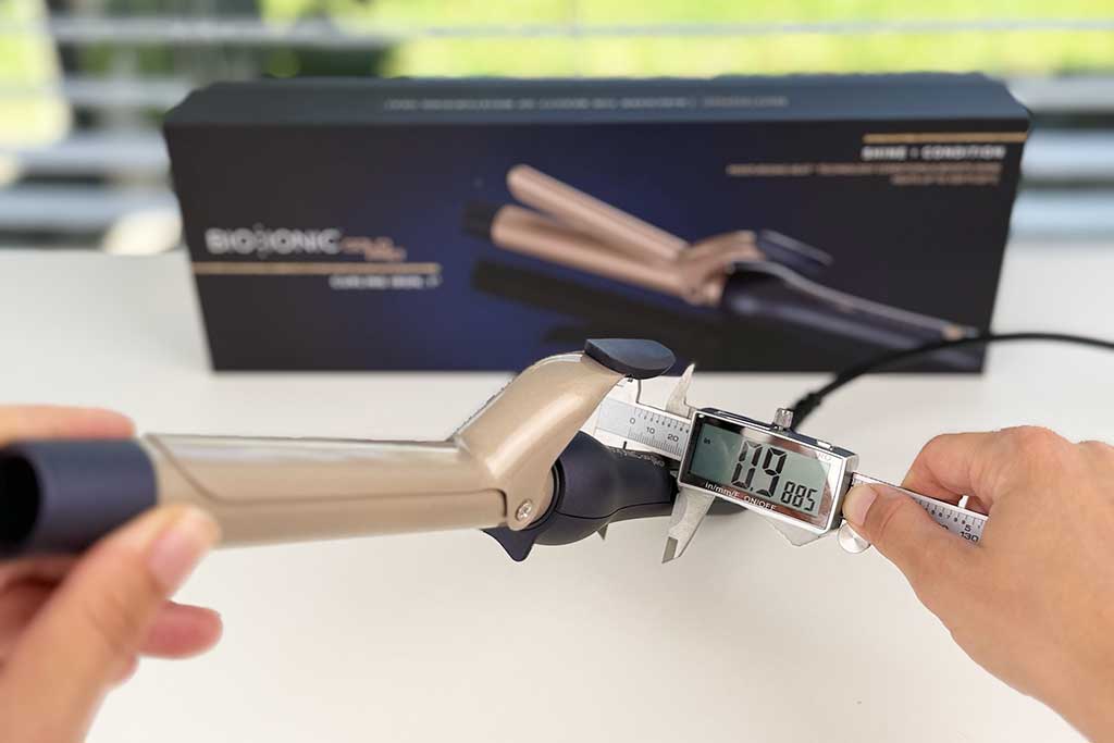Bio Ionic GoldPro Curling Iron handle width measured at 1 inch with calipers.