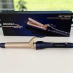 Bio Ionic GoldPro Curling Iron review photo with 24K gold ceramic spring clamp design.