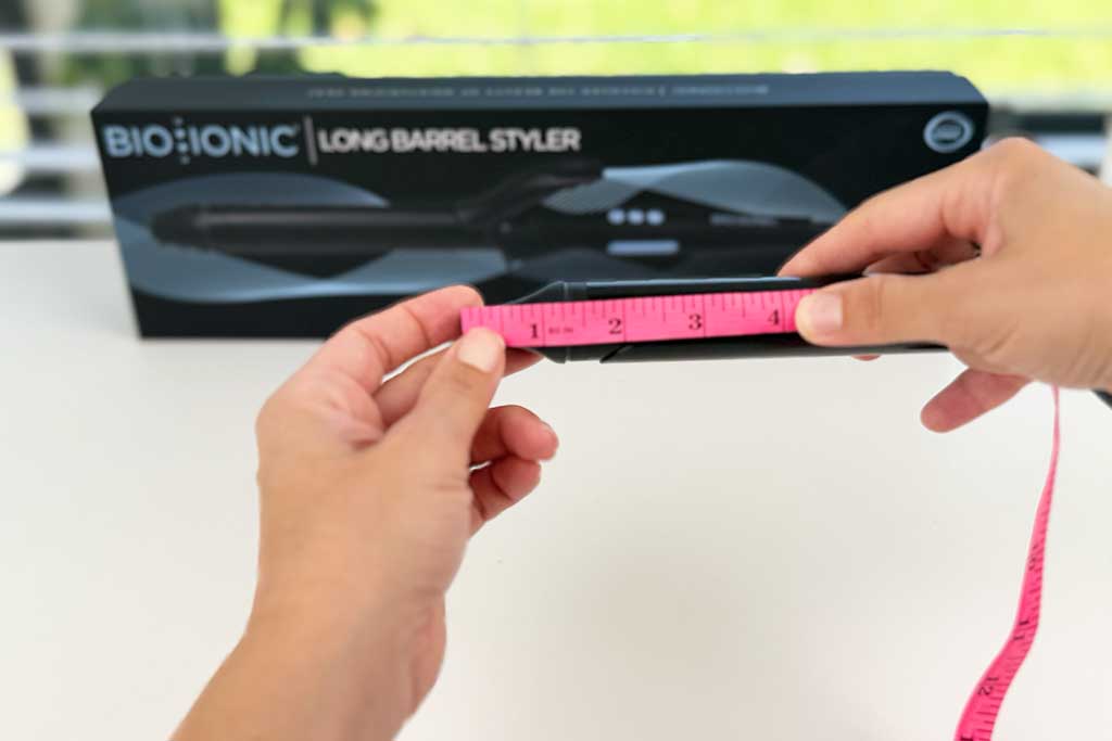 Bio Ionic Long Barrel Curling Iron cool tip length measured at 1.25 inches, with lower surface temperature for safer handling.