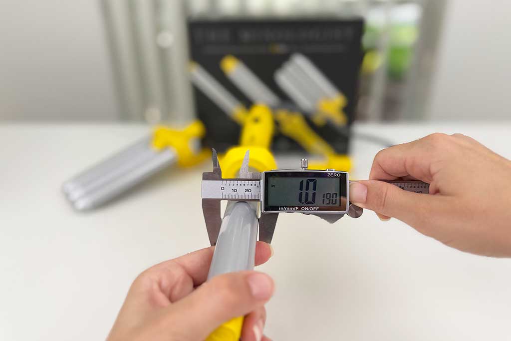 Close-up of the Drybar Mixologist 1-inch wand barrel, showing its sleek ceramic coating.