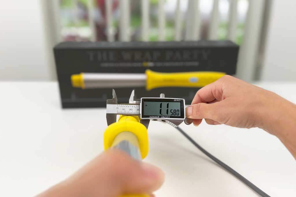 Caliper at the handle, showing 1.23″.