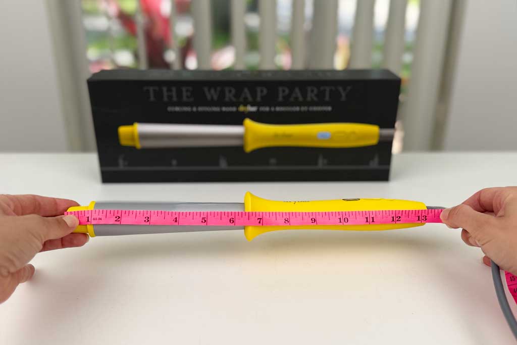 Tape showing the Wrap Party’s total 13.5″ length.