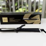 GHD Classic Curl Curling Iron photographed at BeautiLAB Studio, showing its ceramic spring clamp barrel and sleek design.