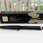 GHD Creative Curl Wand photographed at BeautiLAB Studio, highlighting its tapered ceramic barrel and sleek black design.