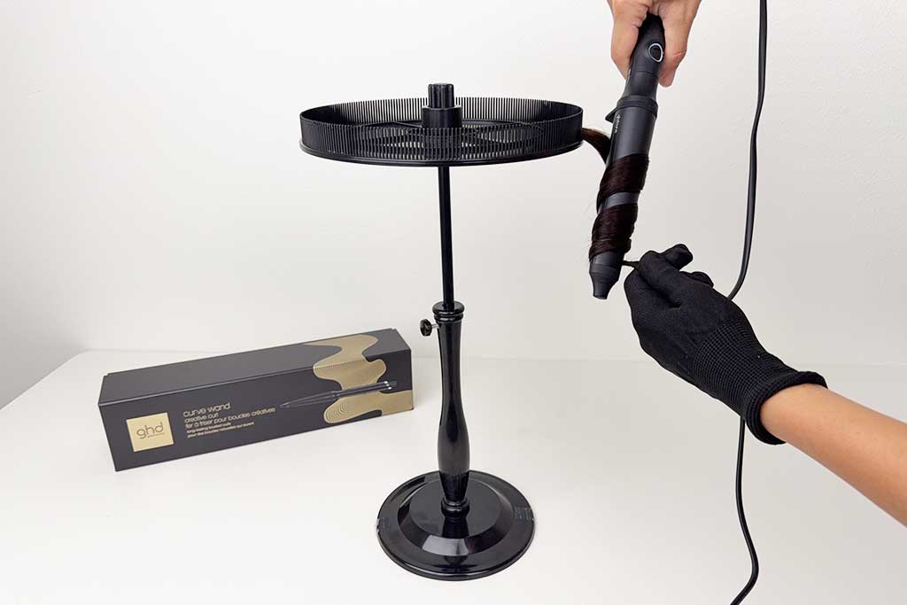 Close-up of natural mid-length hair styled with the GHD Creative Curl Wand, showing smooth, beachy waves created at the preset 365°F.
