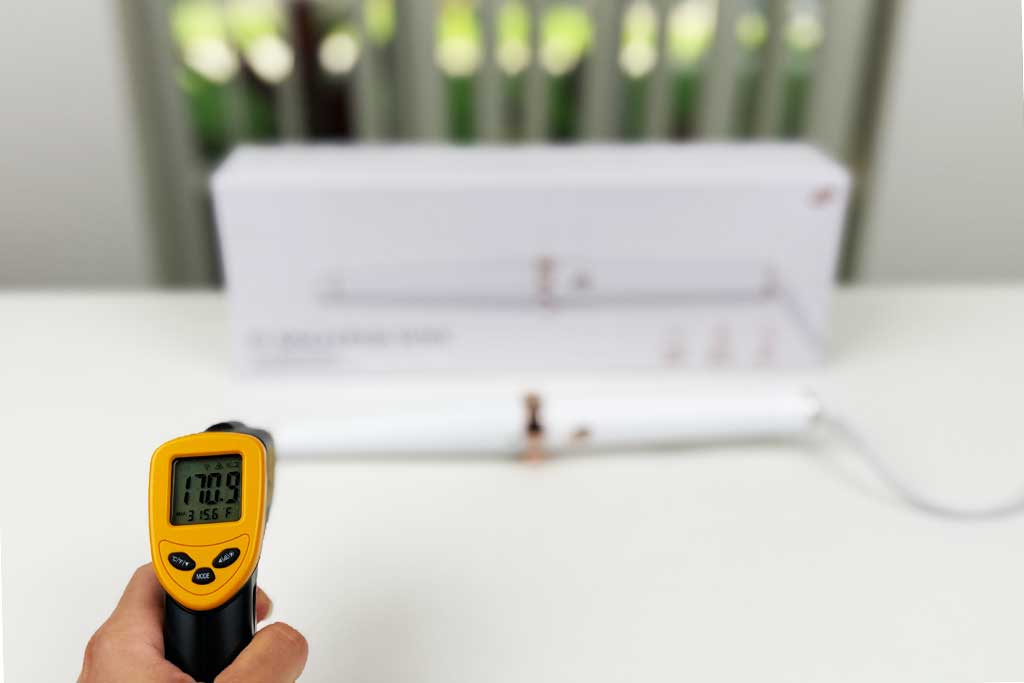Infrared thermometer showing temperature reading on the T3 SinglePass Wave’s 0.75-inch cool tip during testing.