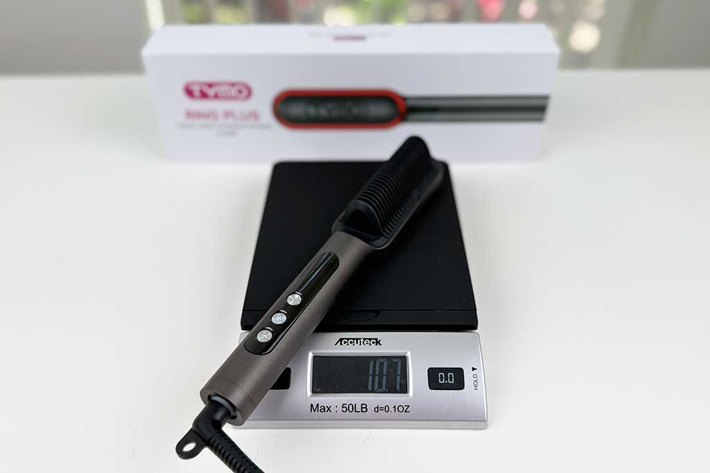 TYMO Ring Plus on digital scale reading approximately 10.7 ounces.