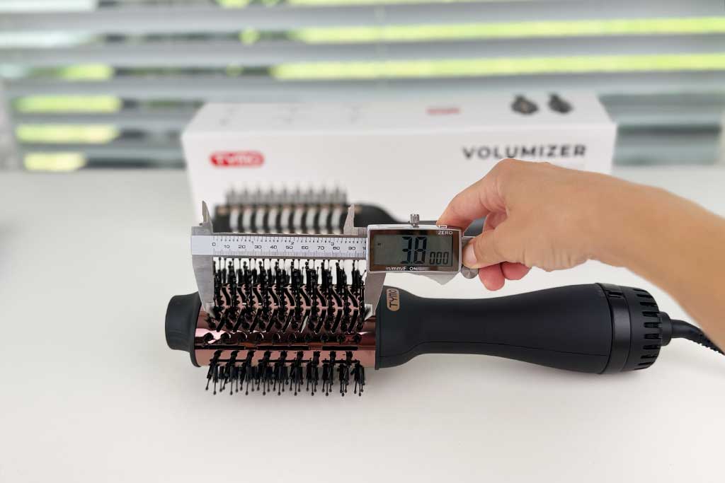 Brush section length measured at 3.8 inches with a measuring tape