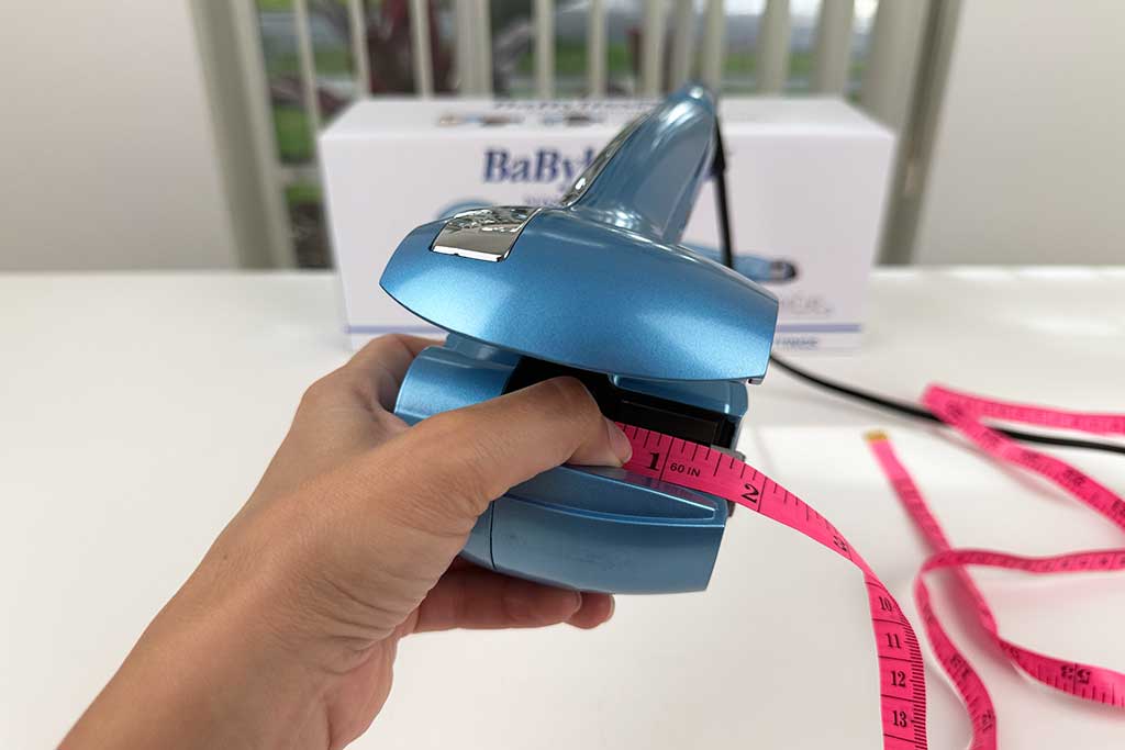 Measuring the MiraCurl 3 curl chamber’s barrel length with a digital caliper.