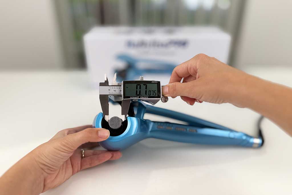 Close-up of the BaBylissPRO MiraCurl 3 curl chamber, adjustable for tighter or thicker curls.