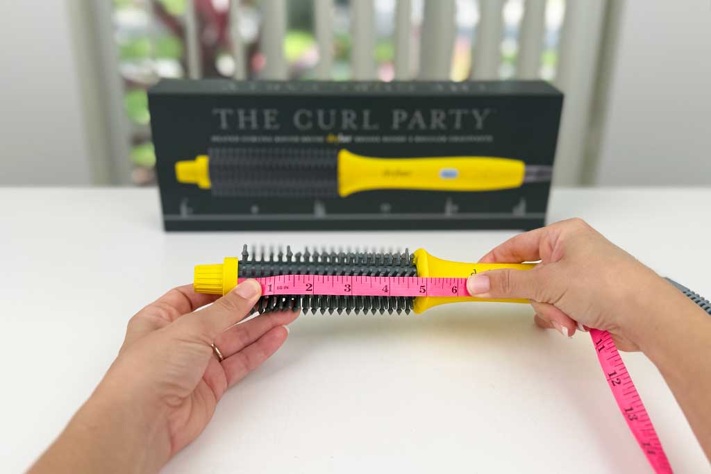 Caliper measuring the 4.75″ barrel of the Curl Party.