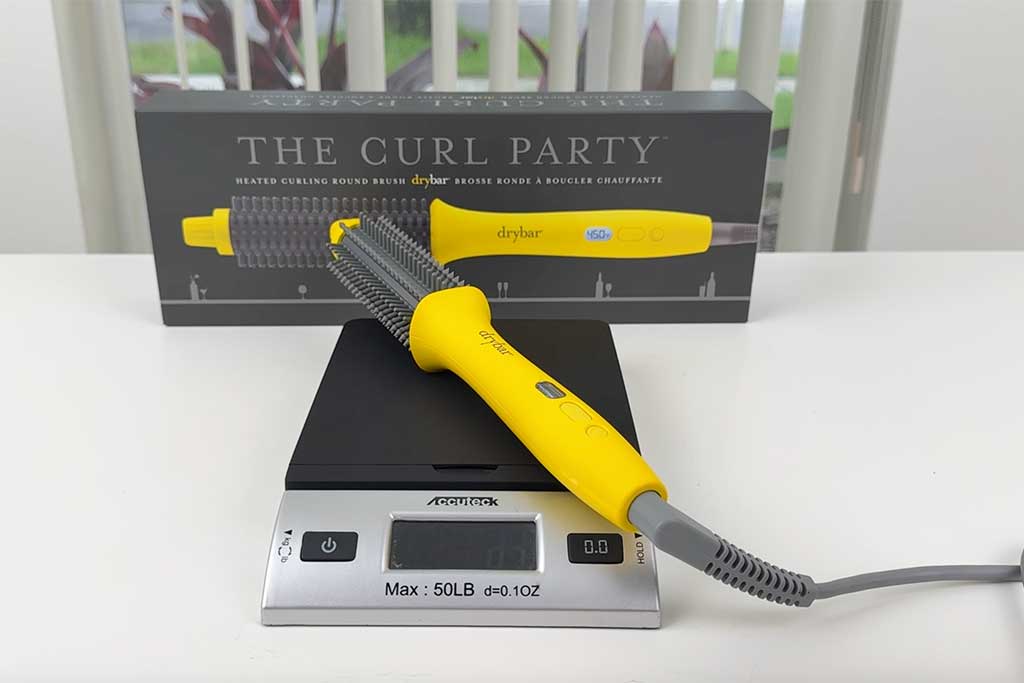 Scale reading 9 oz with the Curl Party brush.