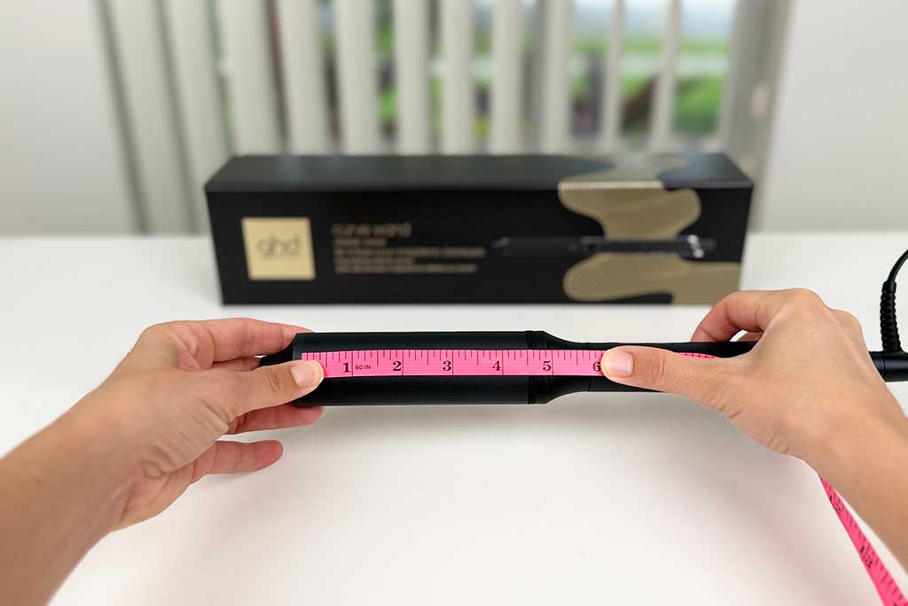Measuring tape showing the 5-inch ceramic barrel length of the GHD Classic Wave Wand.