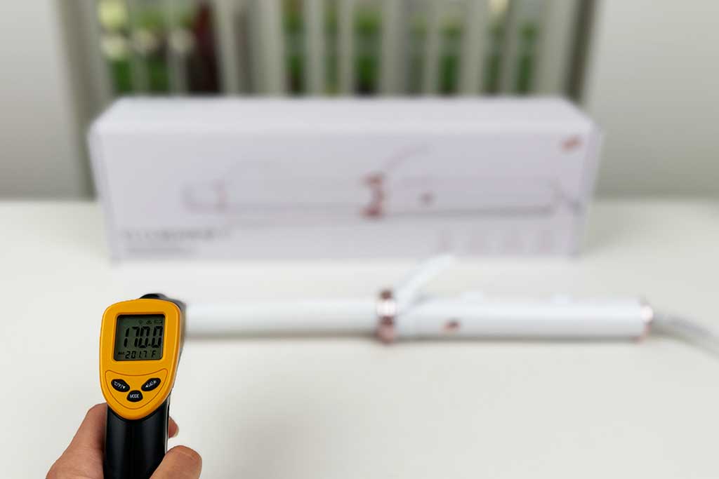 Infrared thermometer showing 170°F while aimed at the cool tip of the T3 CurlWrap curling iron.