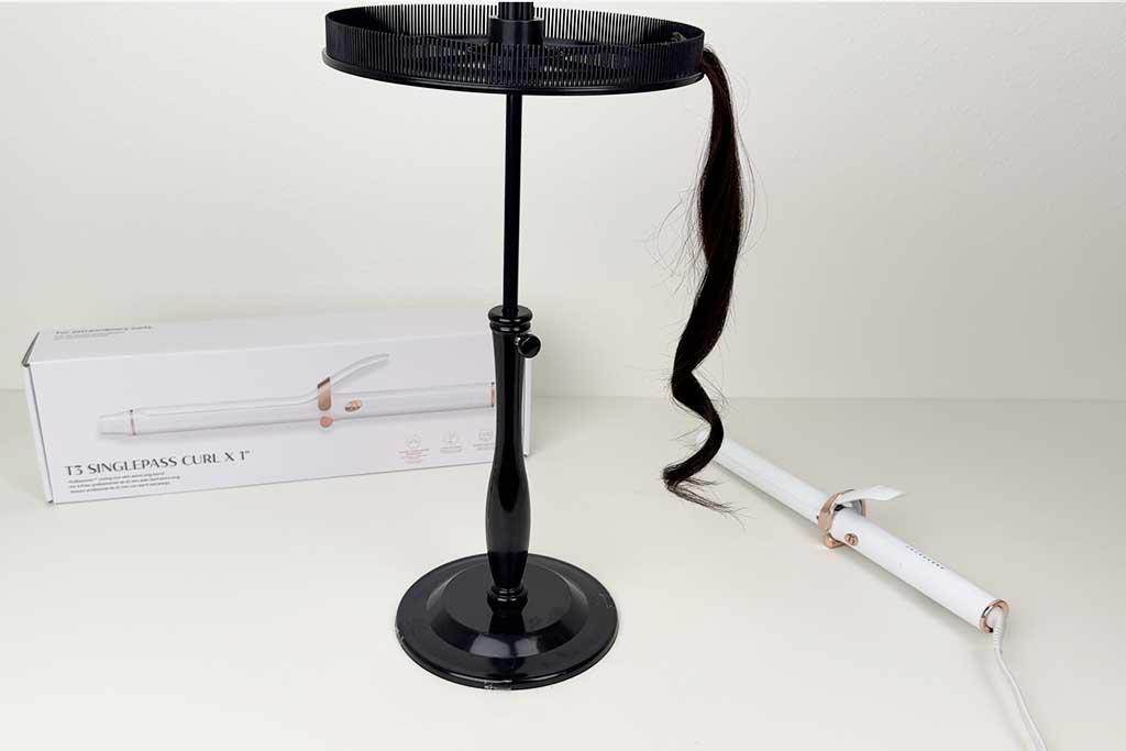 Close-up of defined curls created on wig hair with the T3 SinglePass Curl X curling iron.